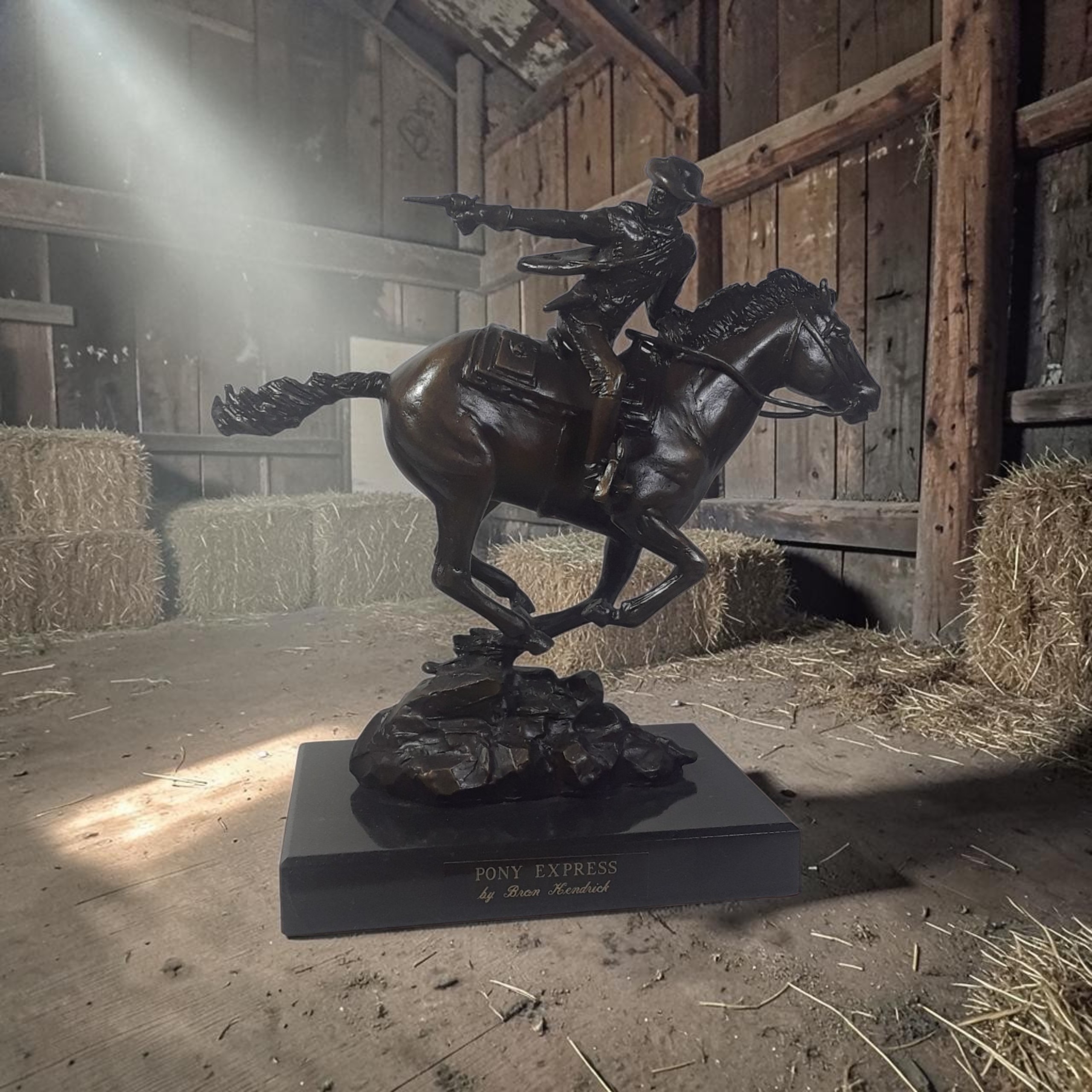 Bron Kendrick’s Pony Express horse-and-rider sculpture, photographed in a barn setting.