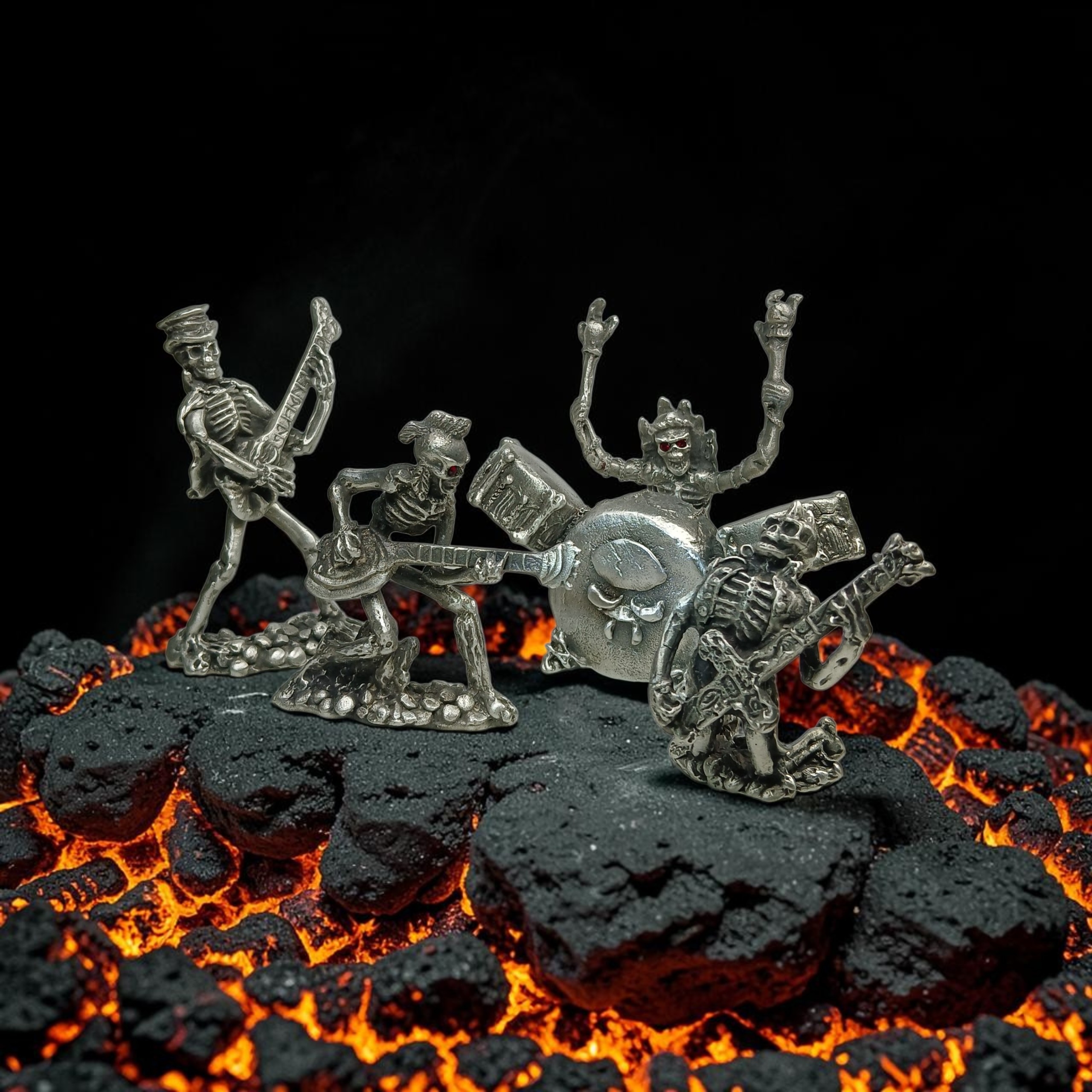Four skeleton musician figurines with guitars and drums against a backdrop of glowing rocks.